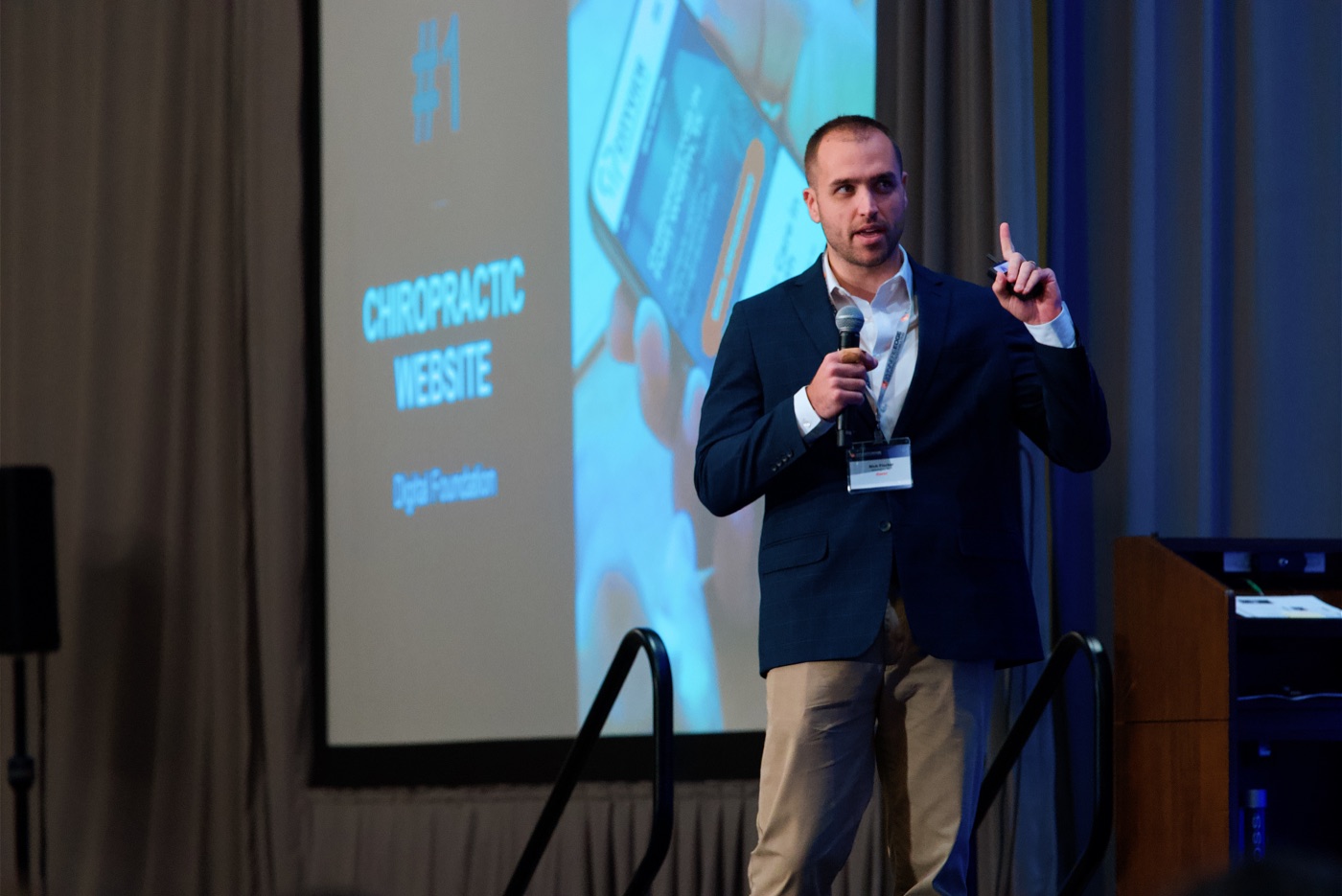 Nick Fischer presenting at a chiropractic seminar