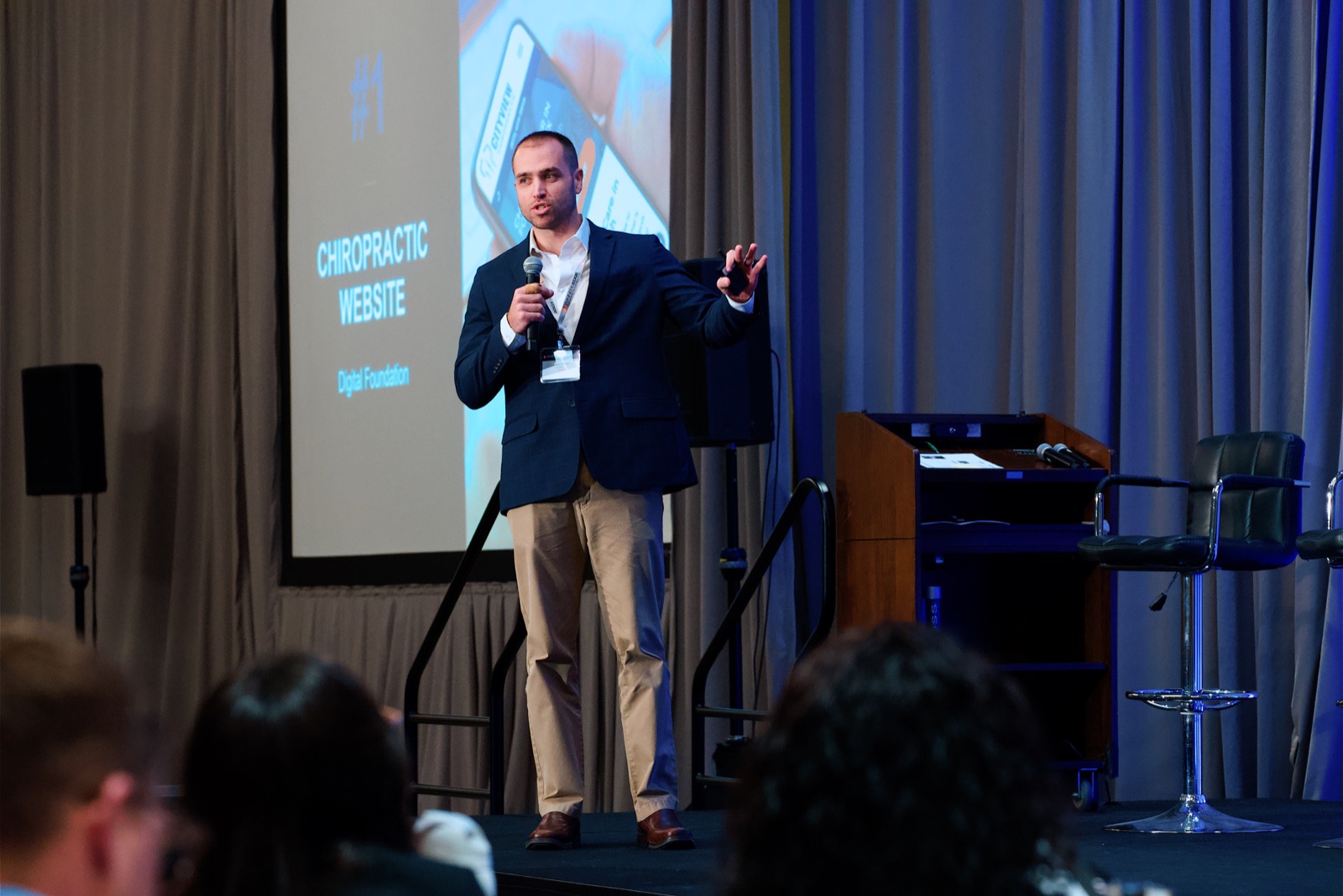 Nick Fischer speaking to an audience